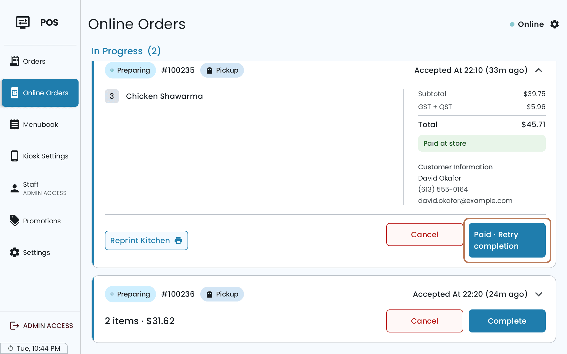 The same order marked Paid at store, its button now reading Paid, Retry completion